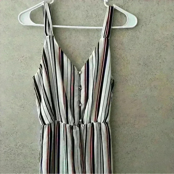 SIENNA SKY SLEEVLESS JUMPSUIT‎ - Picture 1 of 10
